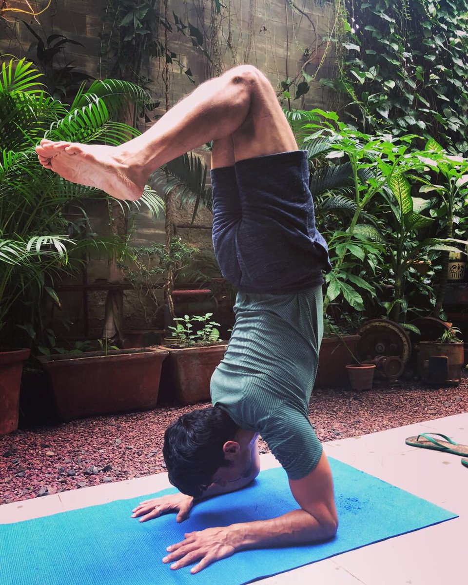 Indian television and film actor, Rajeev Khandelwal midway into a yoga pose