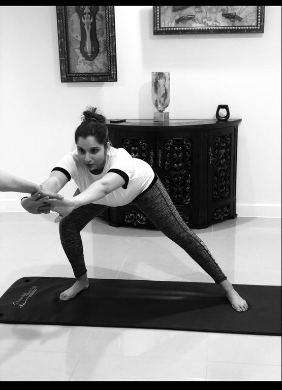 Tennis player Sania Mirza practising Yoga