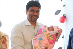 Baby Cherry with her parents and the team of doctors at Rainbow Hospital.